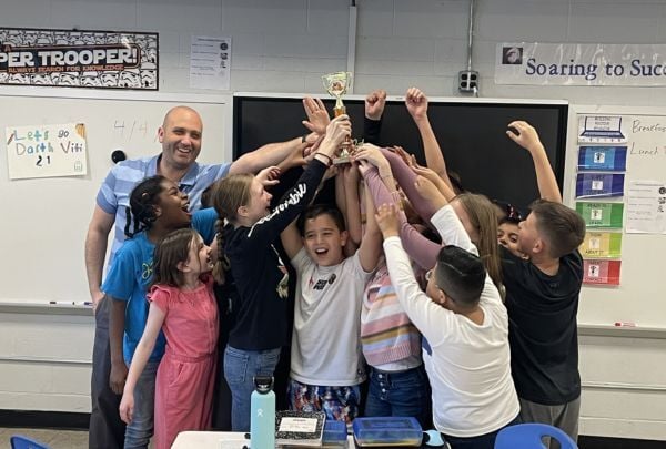 Class celebrating winning a Sumdog contest