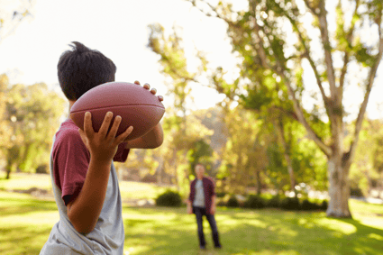 Boy playing american football