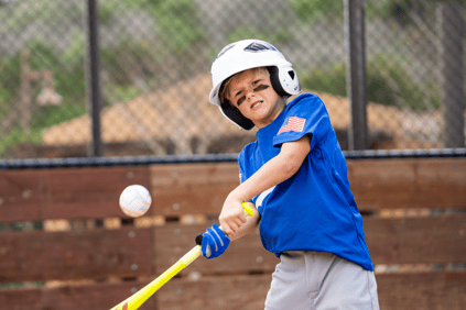 Boy playing baseball