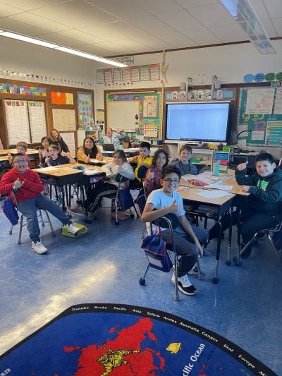 Image of students giving Sumdog a thumbs up