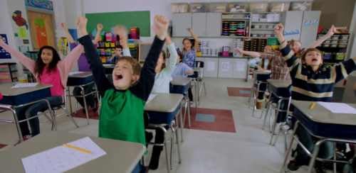 Image-of-students-celebrating-in-class-US Image-of-students-celebrating-in-class-US